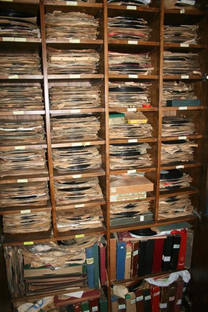 Shelves of phonograph records and other material from the  private collection of Cemal Ünlü