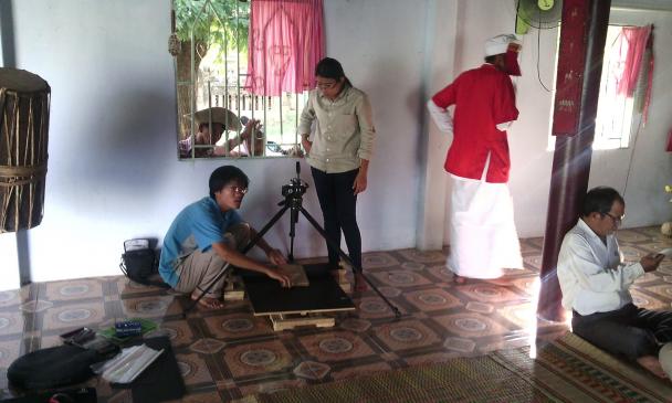 The project team digitising manuscripts in a Cham village